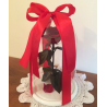 Decoration with a satin ribbon for a rose in a flask